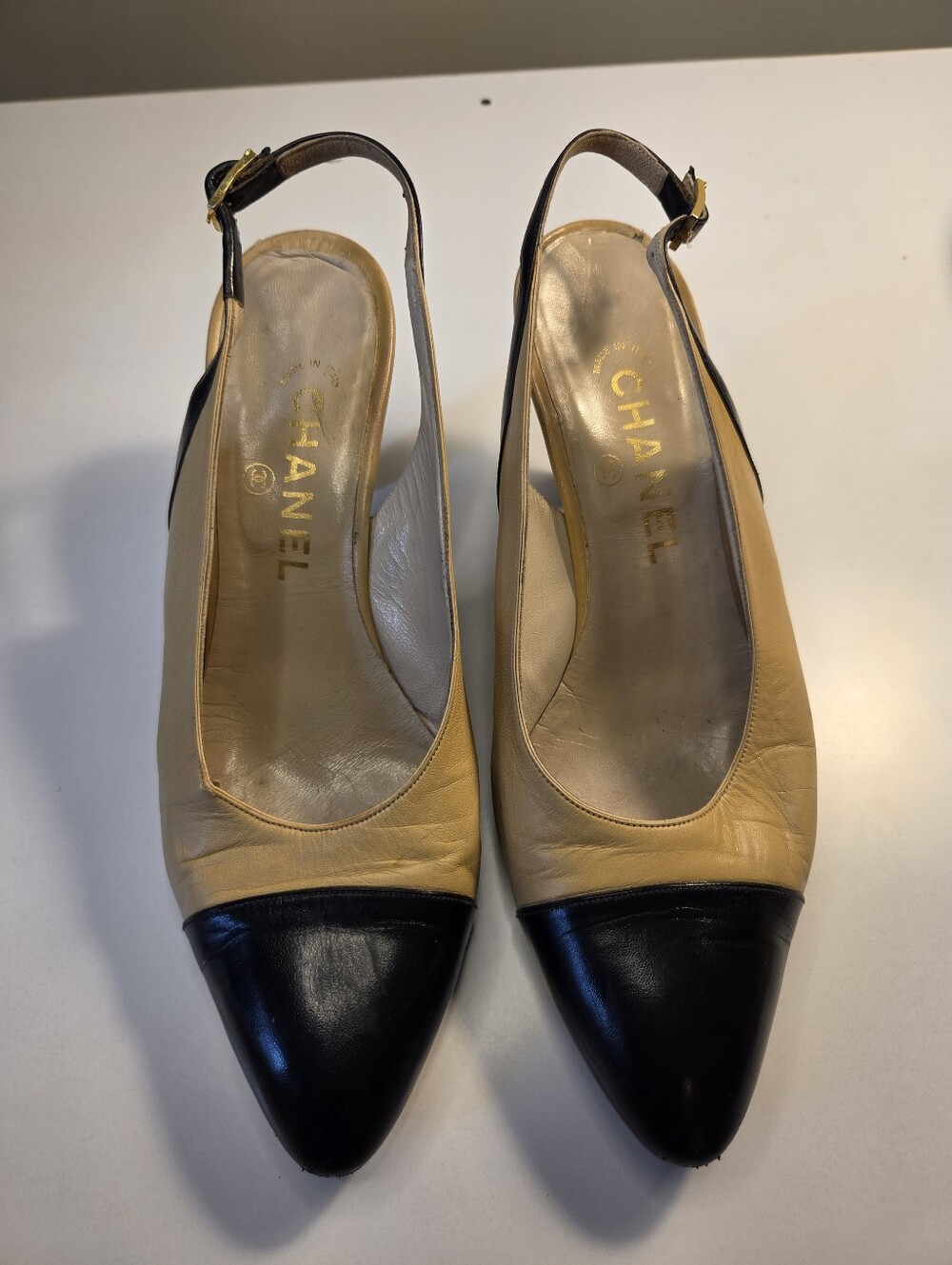 CHANEL Beige Leather Slingback Pumps with Black Cap Toes